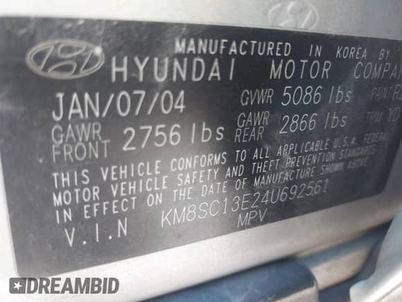 2004 Hyundai Santa Fe GLS with VIN KM8SC13E24U692561, listed as a IAAI auction lot 42888708 with 144,822 mi miles and . Bid and sale history available at DreamBid. Image 9.