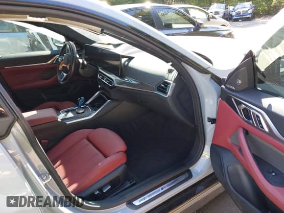 2023 BMW i4 M50 with VIN WBY33AW0XPFP05542, listed as a IAAI auction lot 43029006 with 12,709 mi miles and . Bid and sale history available at DreamBid. Image 5.