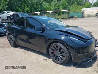 2023 Tesla Model Y Performance with VIN 7SAYGDEF0PF712493, listed as a IAAI auction lot 42393936 with 27,207 mi miles and . Bid and sale history available at DreamBid. Image 1.