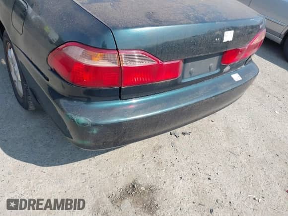1998 Honda Accord EX z VIN 1HGCG1657WA041067, wystawiony jako IAAI lot #42879572 z przebiegiem Nie podano mil oraz . Historia ofert i sprzedaży dostępna na DreamBid. Obrazek 12.