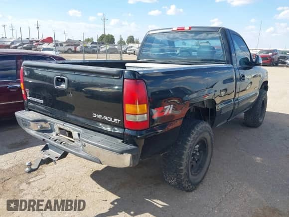 1999 Chevrolet Silverado 1500 with VIN 1GCEK14VXXZ138517, listed as a IAAI auction lot 43337673 with Not provided miles and . Bid and sale history available at DreamBid. Image 4.