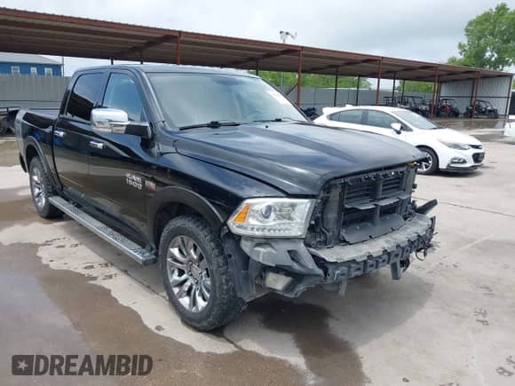 2014 Ram 1500 Longhorn with VIN 1C6RR7PT0ES270564, listed as a IAAI auction lot 42729741 with 146,135 mi miles and . Bid and sale history available at DreamBid. Image 1.