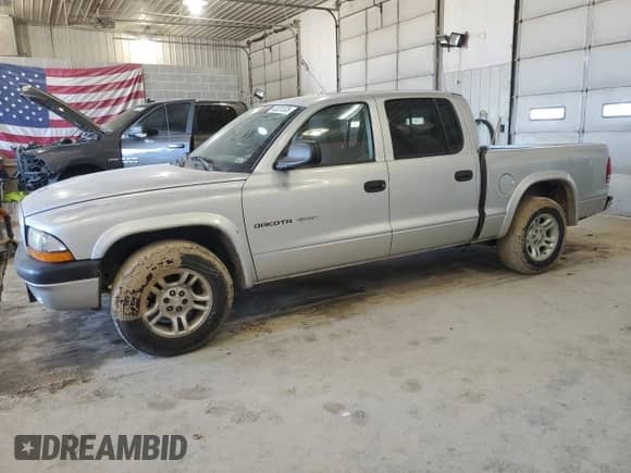 2002 Dodge Dakota Sport z VIN 1B7HL38N62S507858, wystawiony jako Copart lot #48331335 z przebiegiem 200 521 mil mil oraz Szkoda całkowita • Salvage title. Historia ofert i sprzedaży dostępna na DreamBid. Obrazek 1.