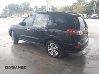 2012 Hyundai Santa Fe Limited с VIN 5XYZK3AB2CG168966, выставлен на аукционе IAAI как лот 43377073 с пробегом 172 284 миль миль и . История ставок и продаж доступна на DreamBid. Изображение 3.