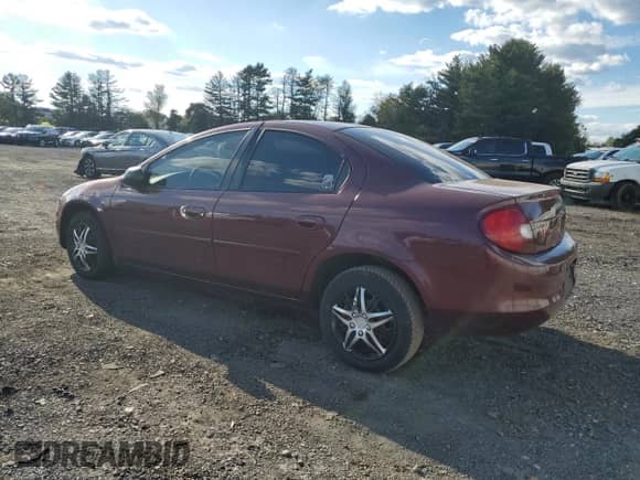 2002 Dodge Neon SE with VIN 1B3ES46C32D598896, listed as a Copart auction lot 74887984 with 93,958 mi miles and Salvage title. Bid and sale history available at DreamBid. Image 2.