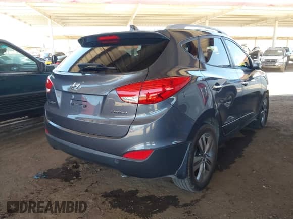 2014 Hyundai Tucson Limited z VIN KM8JU3AG5EU889380, wystawiony jako IAAI lot #42558519 z przebiegiem 100 194 mil mil oraz . Historia ofert i sprzedaży dostępna na DreamBid. Obrazek 4.