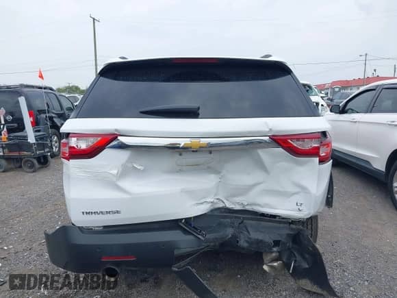 2021 Chevrolet Traverse LT z VIN 1GNERHKW4MJ233642, wystawiony jako IAAI lot #43240454 z przebiegiem 55 052 mil mil oraz . Historia ofert i sprzedaży dostępna na DreamBid. Obrazek 16.