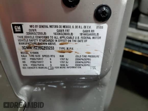 2005 Chevrolet Suburban LS z VIN 3GNFK16Z35G203233, wystawiony jako Copart lot #56381734 z przebiegiem 234 378 mil mil oraz Szkoda całkowita • Salvage title. Historia ofert i sprzedaży dostępna na DreamBid. Obrazek 14.