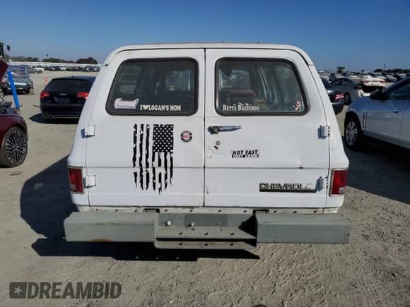 1990 Chevrolet Suburban с VIN 1GNER16K4LF170705, выставлен на аукционе Copart как лот 75886154 с пробегом 223 077 миль миль и Чистый • Clean title. История ставок и продаж доступна на DreamBid. Изображение 6.