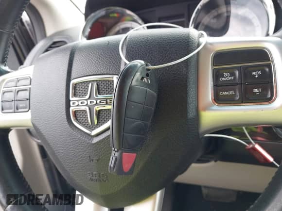 2016 Dodge Grand Caravan SXT z VIN 2C4RDGCG9GR151903, wystawiony jako IAAI lot #43411389 z przebiegiem 225 359 mil mil oraz . Historia ofert i sprzedaży dostępna na DreamBid. Obrazek 11.