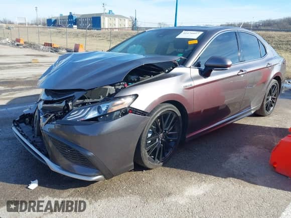 2021 Toyota Camry Hybrid XSE with VIN 4T1K31AK2MU023604, listed as a IAAI auction lot 41476057 with 26,211 mi miles and . Bid and sale history available at DreamBid. Image 17.