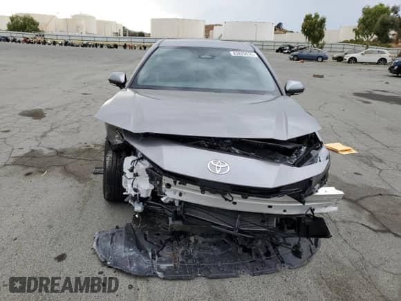 2025 Toyota Camry LE with VIN 4T1DAACKXSU620198, listed as a Copart auction lot 83829035 with 1,218 mi miles and Salvage title. Bid and sale history available at DreamBid. Image 5.