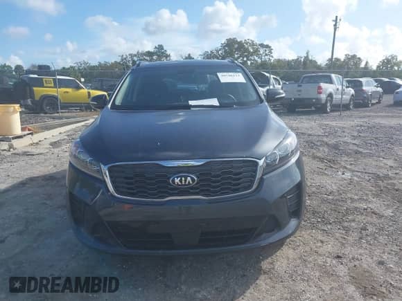 2020 Kia Sorento LX z VIN 5XYPG4A52LG692773, wystawiony jako IAAI lot #40548112 z przebiegiem 37 344 mil mil oraz . Historia ofert i sprzedaży dostępna na DreamBid. Obrazek 12.