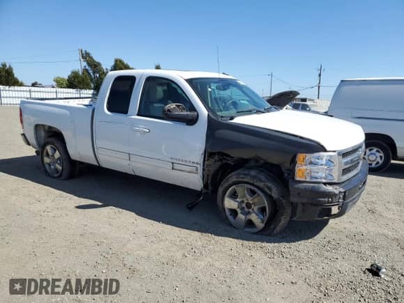 2010 Chevrolet Silverado 1500 LTZ with VIN 1GCSCTE0XAZ135302, listed as a Copart auction lot 68492864 with 223,185 mi miles and Salvage title. Bid and sale history available at DreamBid. Image 4.