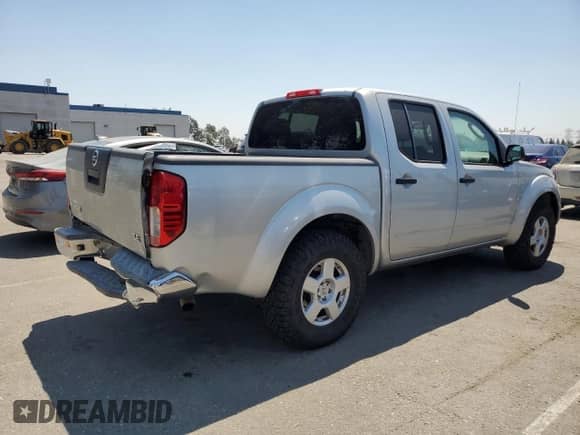 2007 Nissan Frontier SE with VIN 1N6AD07U17C428781, listed as a Copart auction lot 68511875 with 207,735 mi miles and Salvage title. Bid and sale history available at DreamBid. Image 3.
