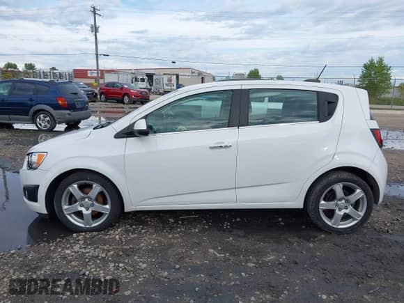 2015 Chevrolet Sonic LTZ with VIN 1G1JE6SB9F4193315, listed as a IAAI auction lot 43279436 with 100,413 mi miles and . Bid and sale history available at DreamBid. Image 13.
