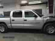 2001 Dodge Dakota Sport with VIN 1B7GL2AX01S123347, listed as a IAAI auction lot 42872308 with 161,373 mi miles and . Bid and sale history available at DreamBid. Image 13.