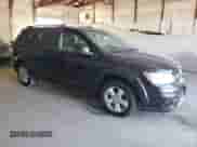 2012 Dodge Journey SXT with VIN 3C4PDCBG0CT144203, listed as a Copart auction lot 70664645 with 135,455 mi miles and Salvage title. Bid and sale history available at DreamBid. Image 4.