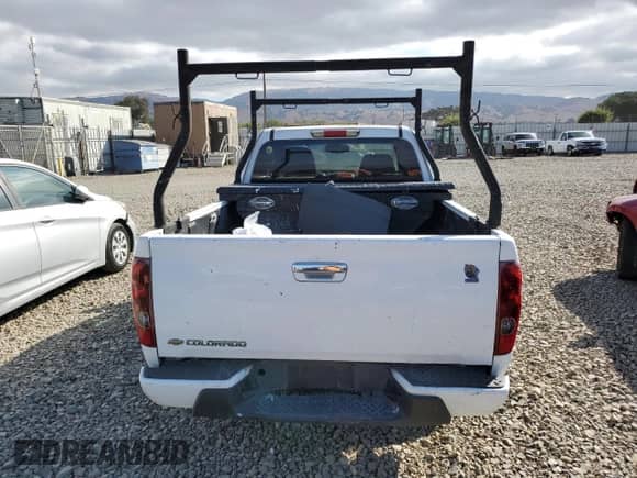 2012 Chevrolet Colorado Work Truck z VIN 1GCESBF99C8164354, wystawiony jako Copart lot #80408635 z przebiegiem 214 766 mil mil oraz Czysty tytuł • Clean title. Historia ofert i sprzedaży dostępna na DreamBid. Obrazek 6.