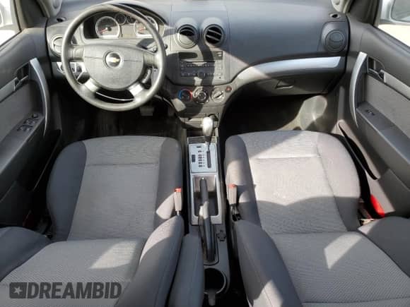 2011 Chevrolet Aveo 1LT z VIN KL1TD6DE3BB205725, wystawiony jako Copart lot #77129904 z przebiegiem 132 792 mil mil oraz Nie do naprawy • Non repairable. Historia ofert i sprzedaży dostępna na DreamBid. Obrazek 8.