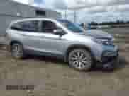 2022 Honda Pilot EX-L with VIN 5FNYF6H54NB021107, listed as a Copart auction lot 80446585 with 61,122 mi miles and Salvage title. Bid and sale history available at DreamBid. Image 4.