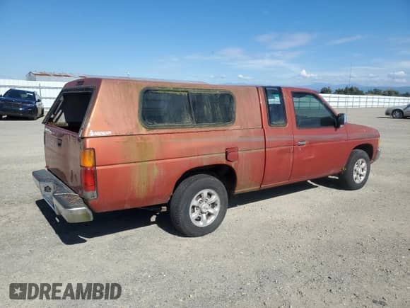 1997 Nissan Frontier XE with VIN 1N6SD16S4VC395458, listed as a Copart auction lot 85908625 with 220,913 mi miles and Clean title. Bid and sale history available at DreamBid. Image 3.