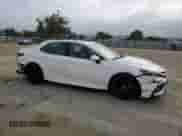 2023 Toyota Camry Hybrid SE with VIN 4T1S31AK0PU046562, listed as a Copart auction lot 69478395 with 84,935 mi miles and Salvage title. Bid and sale history available at DreamBid. Image 4.