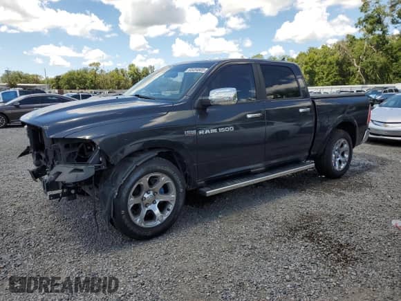 2013 Ram 1500 Laramie with VIN 1C6RR6NT4DS534994, listed as a Copart auction lot 65454605 with 167,373 mi miles and Salvage title. Bid and sale history available at DreamBid. Image 1.