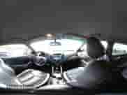 2013 Hyundai Veloster Turbo с VIN KMHTC6AE0DU141811, выставлен на аукционе IAAI как лот 43188913 с пробегом 117 067 миль миль и . История ставок и продаж доступна на DreamBid. Изображение 19.