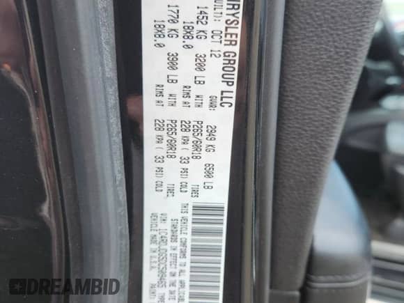 2013 Dodge Durango Crew with VIN 1C4RDJDG5DC509465, listed as a Copart auction lot 87090895 with 146,985 mi miles and Salvage title. Bid and sale history available at DreamBid. Image 12.
