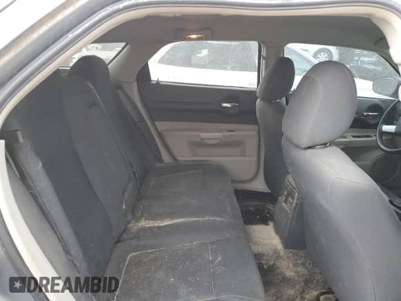 2006 Dodge Magnum SXT with VIN 2D4GZ47V76H473558, listed as a Copart auction lot 72087564 with 122,810 mi miles and Salvage title. Bid and sale history available at DreamBid. Image 10.
