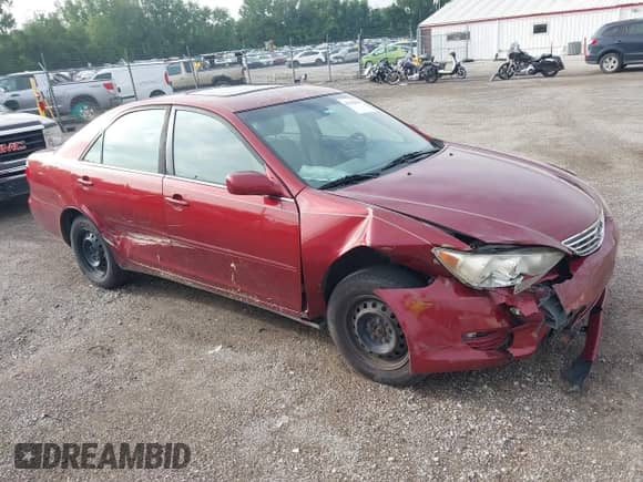 2005 Toyota Camry STD with VIN 4T1BE32K55U060541, listed as a IAAI auction lot 42962839 with 311,006 mi miles and . Bid and sale history available at DreamBid. Image 1.