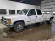 1997 Chevrolet Silverado 3500 с VIN 1GCHC33J5VF002668, выставлен на аукционе Copart как лот 87199575 с пробегом 156 834 миль миль и Чистый • Clean title. История ставок и продаж доступна на DreamBid. Изображение 1.