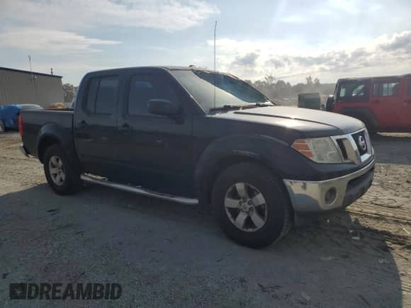 2011 Nissan Frontier SV with VIN 1N6AD0ER5BC441976, listed as a Copart auction lot 70905715 with 243,384 mi miles and Salvage title. Bid and sale history available at DreamBid. Image 4.