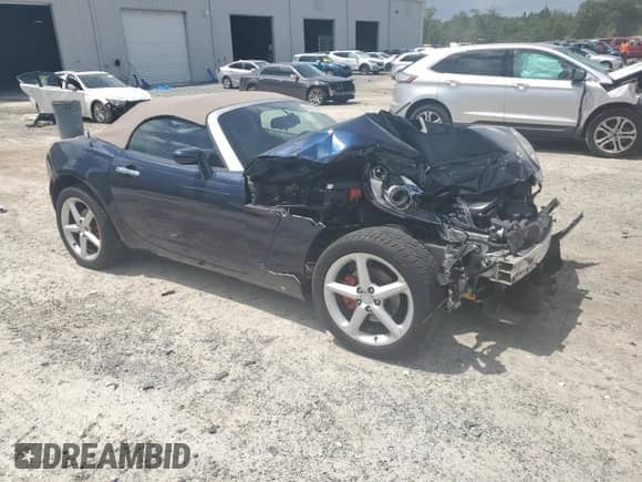2007 Saturn Sky with VIN 1G8MB35B67Y103887, listed as a Copart auction lot 69271544 with 62,365 mi miles and Salvage title. Bid and sale history available at DreamBid. Image 4.