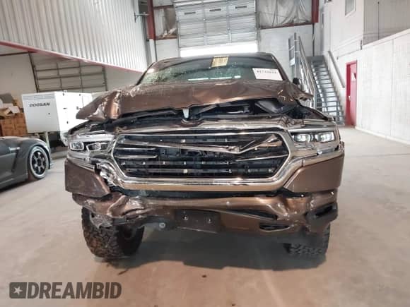 2020 Ram 1500 Longhorn with VIN 1C6SRFKT1LN275397, listed as a IAAI auction lot 42733634 with 101,019 mi miles and . Bid and sale history available at DreamBid. Image 6.