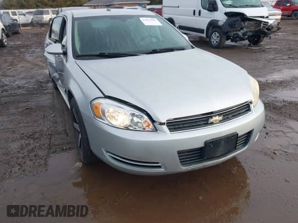 2010 Chevrolet Impala Police Police z VIN 2G1WD5EM7A1241253, wystawiony jako IAAI lot #41693986 z przebiegiem 90 200 mil mil oraz . Historia ofert i sprzedaży dostępna na DreamBid. Obrazek 1.