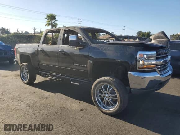 2017 Chevrolet Silverado 1500 LT with VIN 3GCUKREC7HG273236, listed as a Copart auction lot 82217865 with Not provided miles and Non repairable. Bid and sale history available at DreamBid. Image 4.