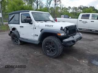 2022 Jeep Wrangler Sport S with VIN 1C4GJXAN9NW124190, listed as a IAAI auction lot 42027247 with 8,376 mi miles and . Bid and sale history available at DreamBid. Image 1.