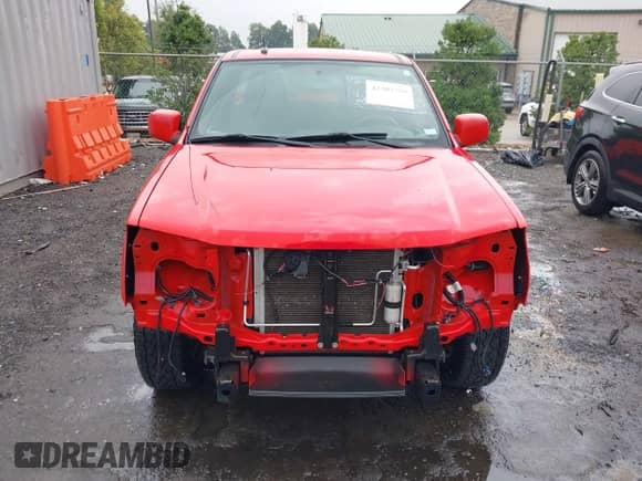 2012 Chevrolet Colorado Work Truck z VIN 1GCCSBF99C8127098, wystawiony jako IAAI lot #43303759 z przebiegiem 79 862 mil mil oraz . Historia ofert i sprzedaży dostępna na DreamBid. Obrazek 13.