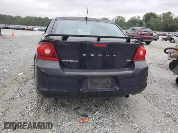 2014 Dodge Avenger SXT с VIN 1C3CDZCB5EN202317, выставлен на аукционе Copart как лот 70012075 с пробегом 171 102 миль миль и Списание • Salvage title. История ставок и продаж доступна на DreamBid. Изображение 6.