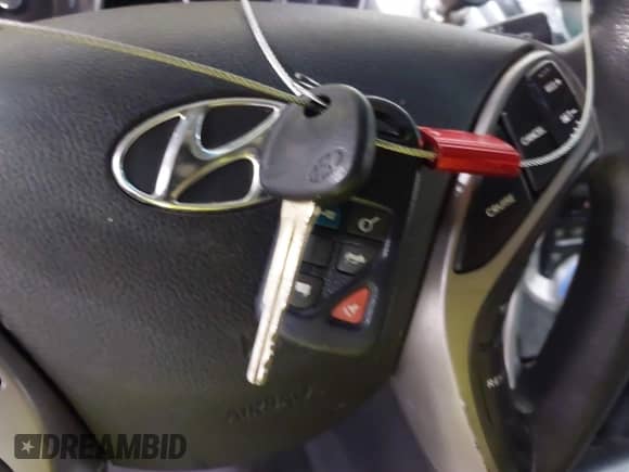 2013 Hyundai Elantra GLS z VIN 5NPDH4AE6DH300890, wystawiony jako IAAI lot #43073166 z przebiegiem 163 666 mil mil oraz . Historia ofert i sprzedaży dostępna na DreamBid. Obrazek 11.