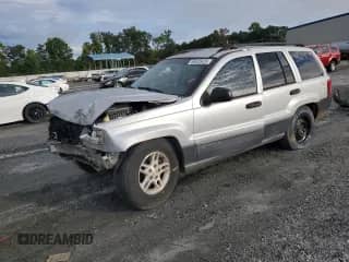 2004 Jeep Grand Cherokee Laredo with VIN 1J4GX48S04C313409, listed as a Copart auction lot 68535425 with Not provided miles and Salvage title. Bid and sale history available at DreamBid. Image 1.