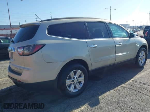 2014 Chevrolet Traverse LT z VIN 1GNKRHKD3EJ109929, wystawiony jako IAAI lot #42515411 z przebiegiem Nie podano mil oraz . Historia ofert i sprzedaży dostępna na DreamBid. Obrazek 4.