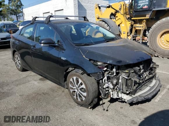 2020 Toyota Prius LE с VIN JTDKARFP5L3142104, выставлен на аукционе Copart как лот 71806605 с пробегом 100 878 миль миль и Списание • Salvage title. История ставок и продаж доступна на DreamBid. Изображение 4.