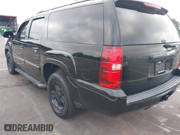 2008 Chevrolet Suburban LTZ z VIN 3GNFC16098G192144, wystawiony jako IAAI lot #42905762 z przebiegiem 426 715 mil mil oraz . Historia ofert i sprzedaży dostępna na DreamBid. Obrazek 3.