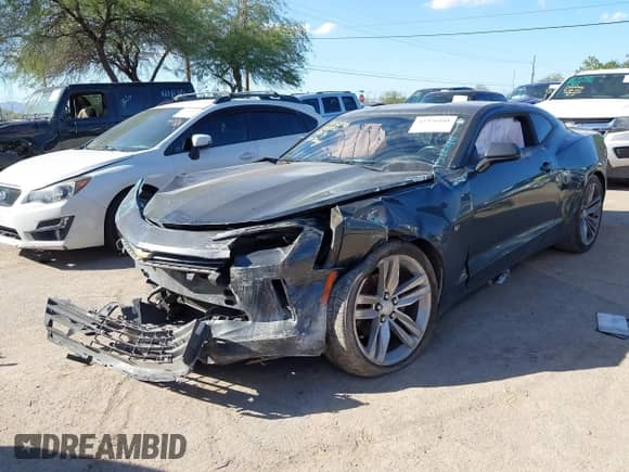 2017 Chevrolet Camaro 1LT z VIN 1G1FB1RX4H0151244, wystawiony jako IAAI lot #43476941 z przebiegiem 111 656 mil mil oraz . Historia ofert i sprzedaży dostępna na DreamBid. Obrazek 6.