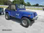 1990 Jeep Wrangler z VIN 2J4FY39T8LJ519849, wystawiony jako Copart lot #50917265 z przebiegiem 153 966 mil mil oraz Czysty tytuł • Clean title. Historia ofert i sprzedaży dostępna na DreamBid. Obrazek 4.