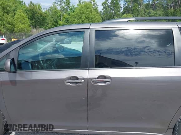 2015 Toyota Sienna SE with VIN 5TDXK3DC9FS598741, listed as a IAAI auction lot 42351368 with 150,054 mi miles and . Bid and sale history available at DreamBid. Image 14.