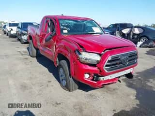 2018 Toyota Tacoma SR with VIN 5TFRX5GN4JX120443, listed as a IAAI auction lot 42755579 with 63,186 mi miles and . Bid and sale history available at DreamBid. Image 1.